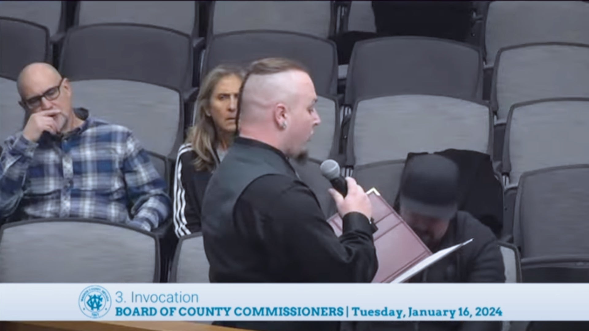 Satanist opens district meeting with an invocation cheering Satan: “A Battle Between Good and Evil.”