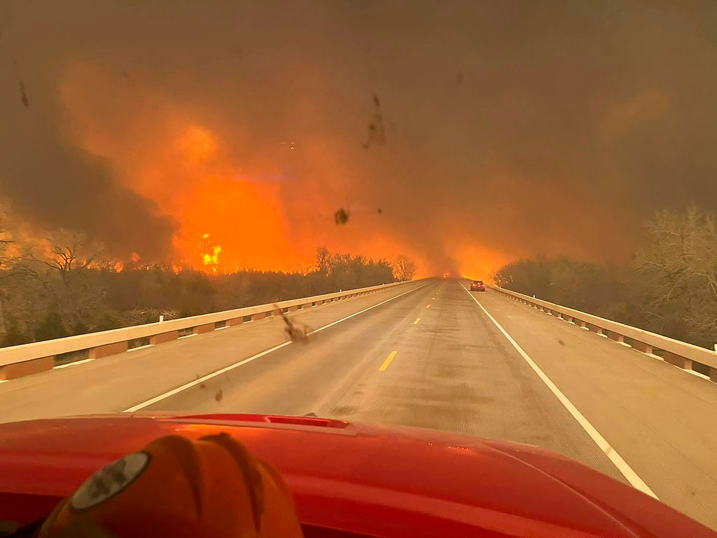 Firefighters are trying to contain massive wildfires in Texas ahead of the weekend of higher temperatures and winds
